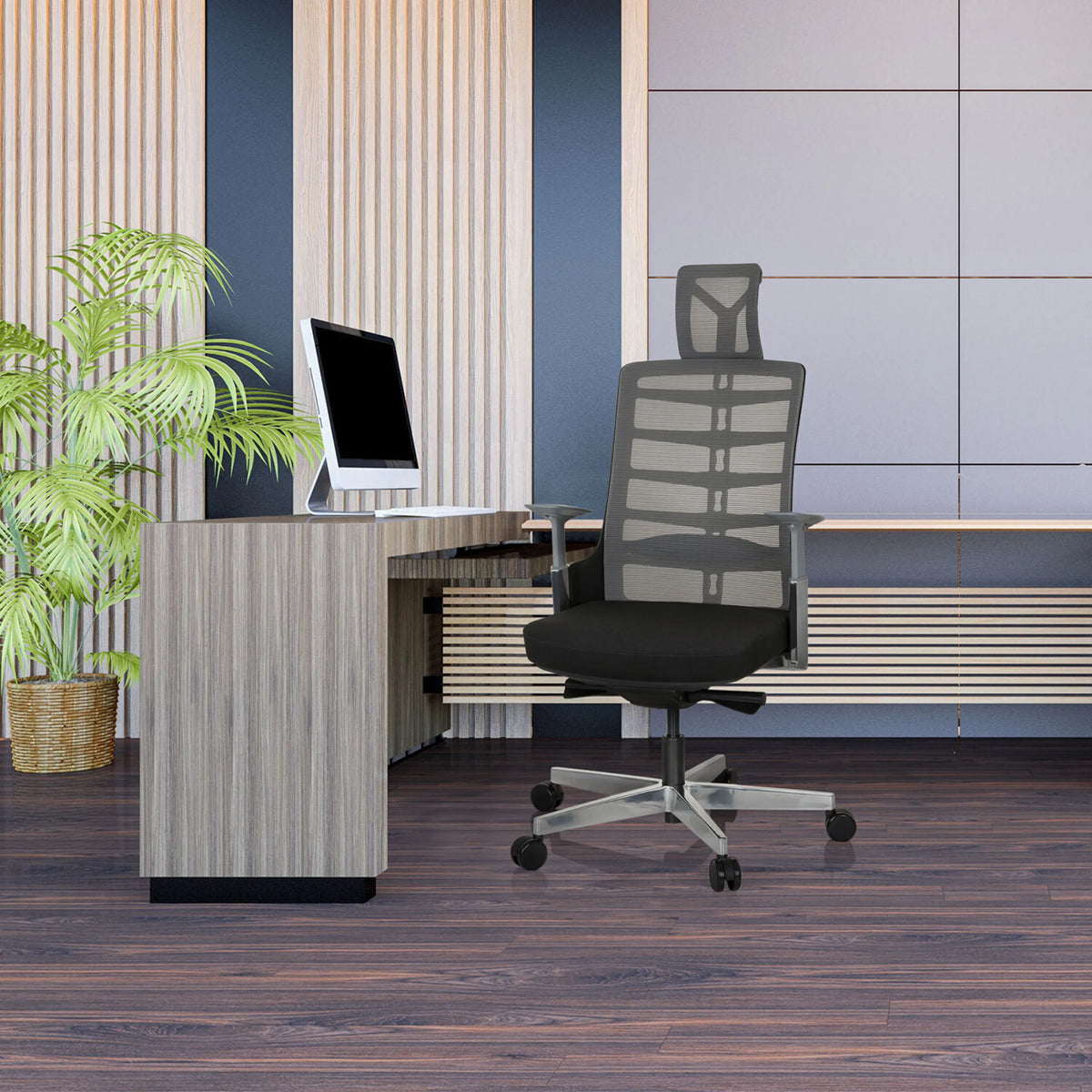 Sedia da ufficio high-end SKARIF in nero-grigio davanti a una scrivania in un ufficio moderno di hjh OFFICE