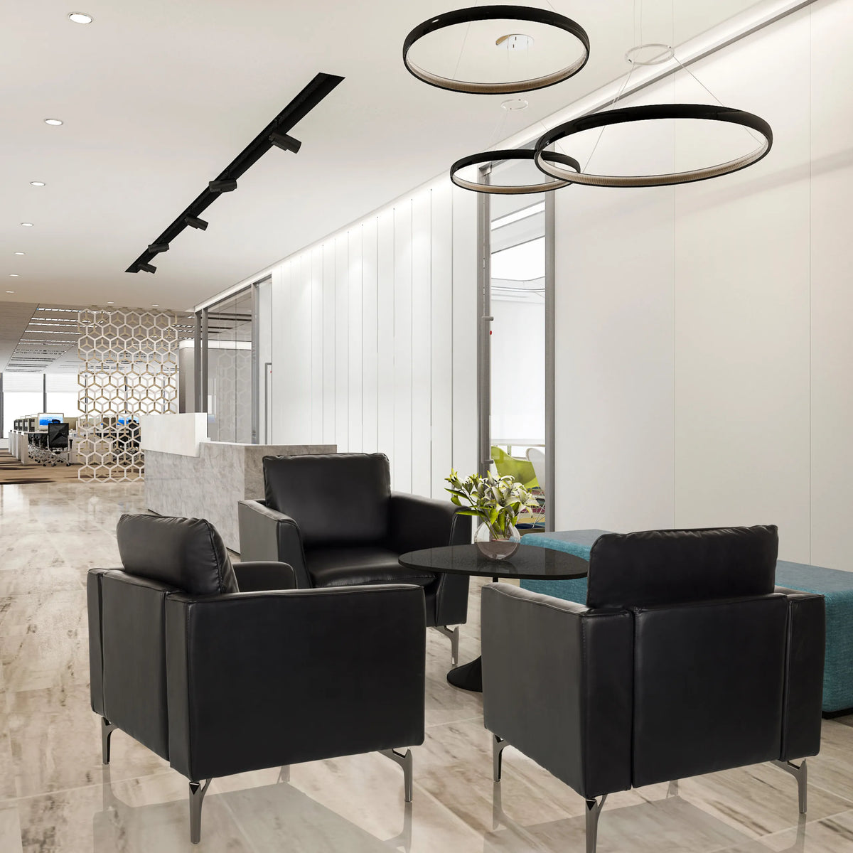Tre Poltrone Lounge BAVERO nere in ecopelle in una lounge per ufficio moderna di hjh OFFICE