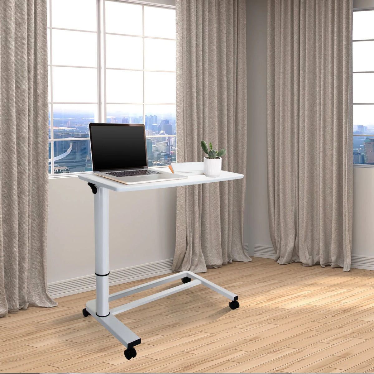 Scrivania in piedi bianca STAND II con ruote e laptop su un pavimento in legno chiaro di hjh OFFICE