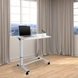 Scrivania in piedi bianca STAND II con ruote e laptop su un pavimento in legno chiaro di hjh OFFICE