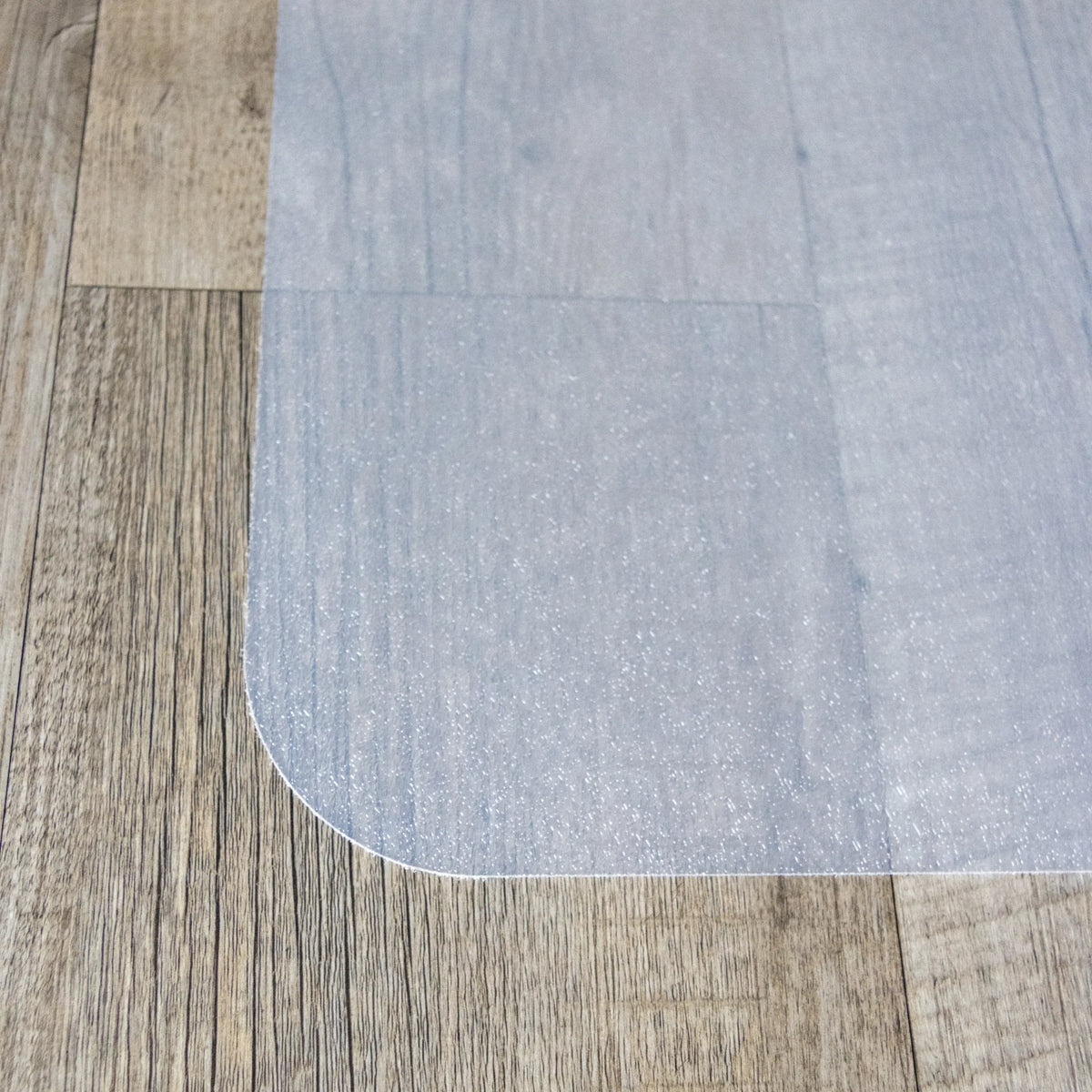 Angolo arrotondato del Tappetino FORTIFLEX bianco latte per pavimenti duri di hjh OFFICE