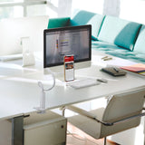 Supporto per cellulare e tablet FLEXMOBI I bianco su una scrivania con uno smartphone di hjh OFFICE