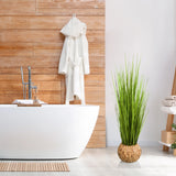 Pianta artificiale verde CORTADERIA in un cesto intrecciato come decorazione di hjh OFFICE