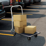 Carrello a piattaforma CARRY blu e bianco con tre scatole di cartone caricate in un parcheggio di hjh OFFICE