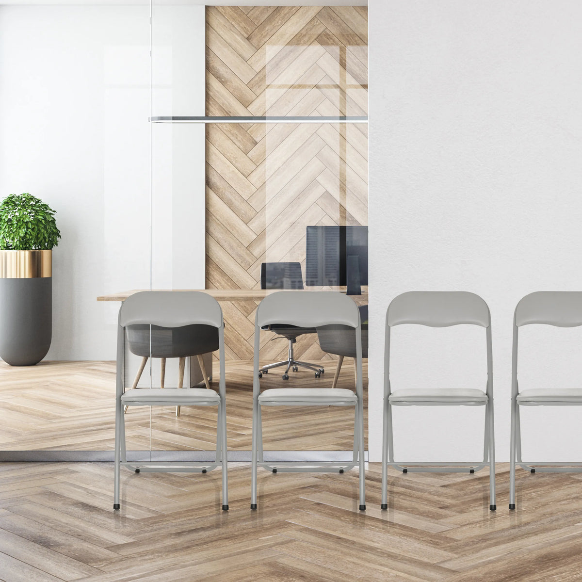Sedie pieghevoli TUDELA BASIC grigie in PVC in un moderno ambiente d'ufficio di hjh OFFICE