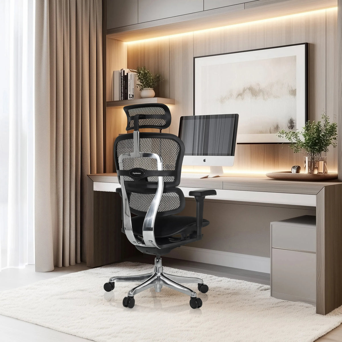Poltrona di lusso ERGOHUMAN ULTRA F GEN2 con schienale in rete e braccioli in un moderno ufficio in casa di hjh OFFICE
