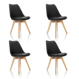 Set di quattro sedie a conchiglia SCANDI 4 nere con gambe in legno chiaro di hjh OFFICE
