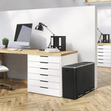 Cestini nero Clean 9 con due scomparti accanto a una scrivania di hjh OFFICE