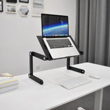 Rialzo da scrivania VM-SA II in nero con un laptop su una scrivania bianca di hjh OFFICE