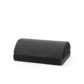 Poggiapiedi nero Podi Velvet 1 con una superficie imbottita semicircolare di hjh OFFICE