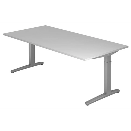 Scrivania regolabile in altezza XTRA XB 2E SS in grigio con un grande piano rettangolare di hjh OFFICE PRO